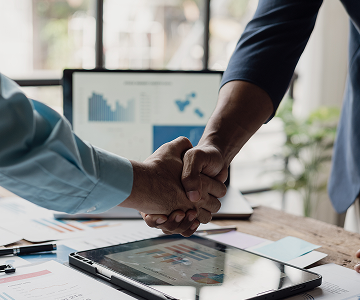 Two people making a business agreement